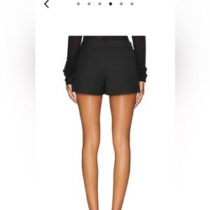 Black tailored micro shorts, size med but fit like a S (I’m a 27 for reference)